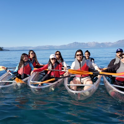 big group of people family on clear kayak adventure at Lake Tahoe
