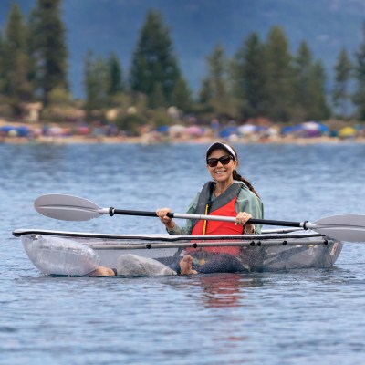 a man rowing a boat in the water